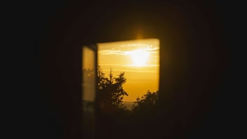 Golden light seen through a window