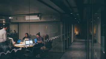 Small group connecting at a work gathering