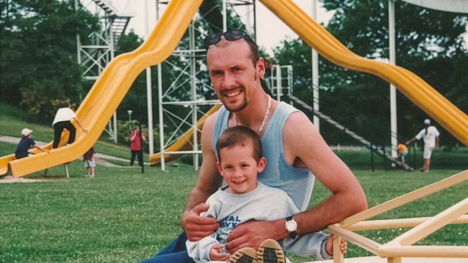 Dad and son sharing a happy moment at the playground
