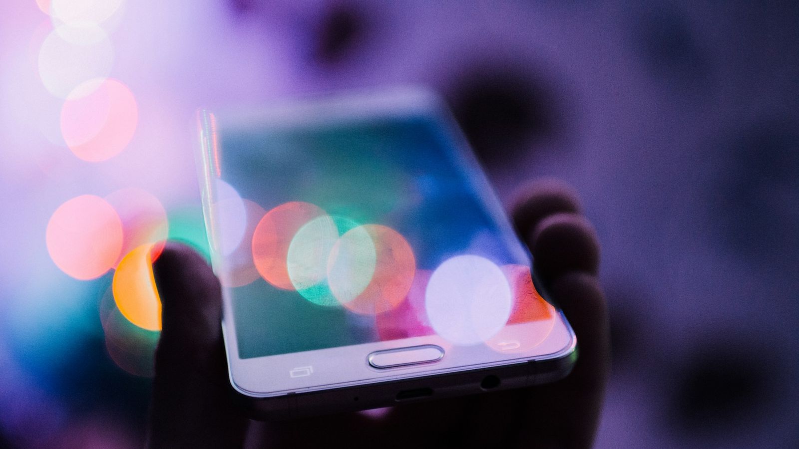 Hands holding a smartphone
