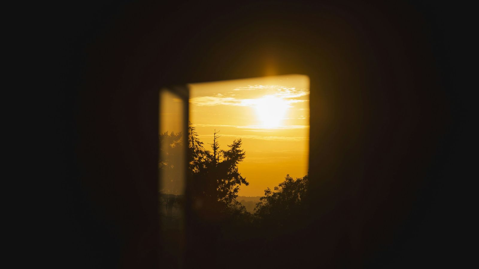 Golden light seen through a window