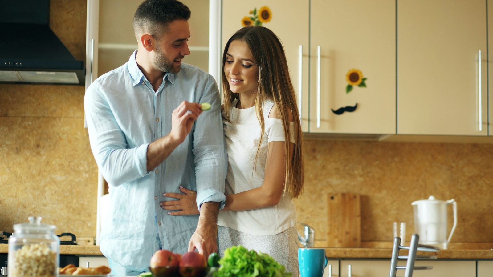 Couple sharing a happy morning in the kitchen
