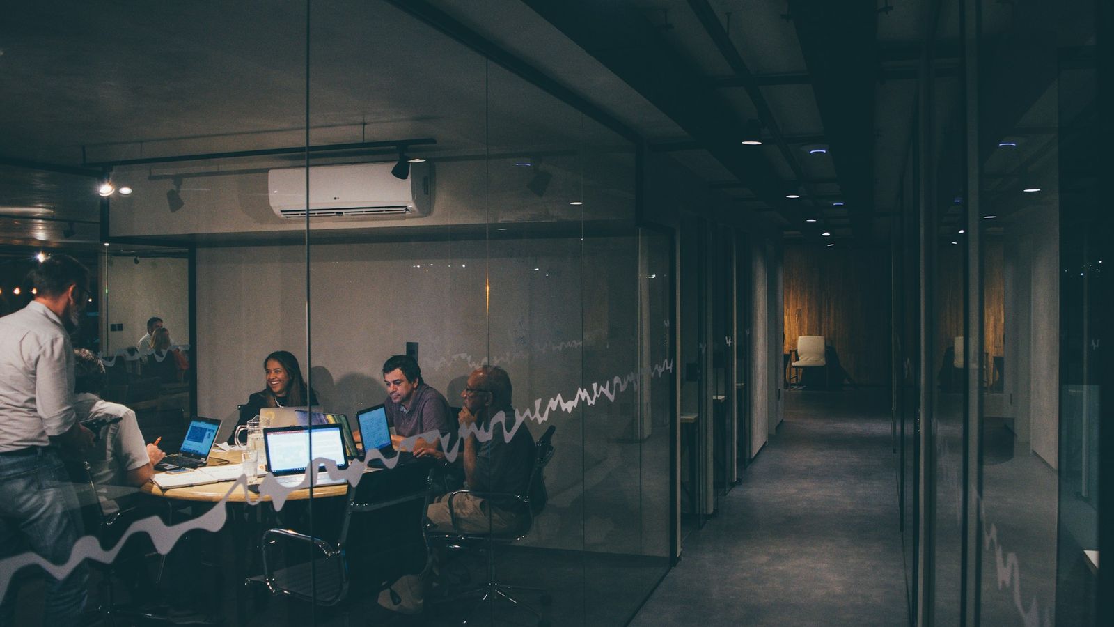 Small group connecting at a work gathering