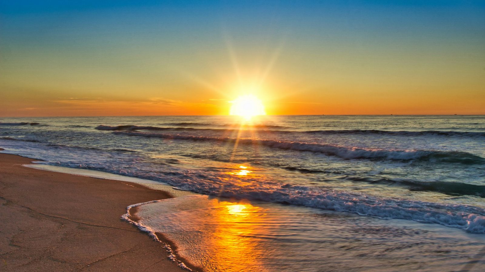 Sunlight breaking over the seashore